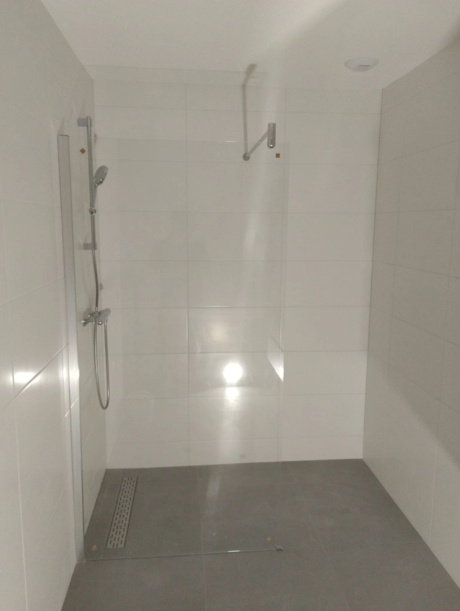 Finished bathroom with new vanity, shower and tiles